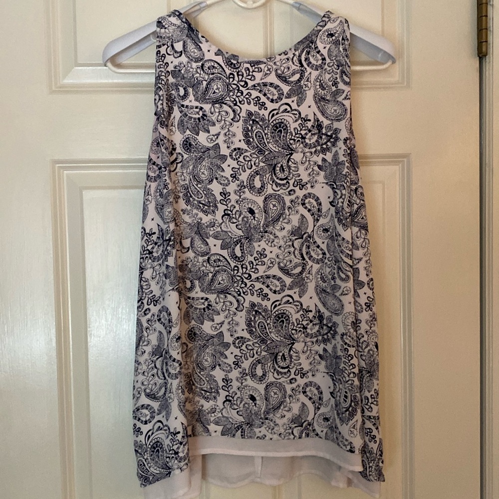 SLEEVELESS TUNIC BLOUSE
